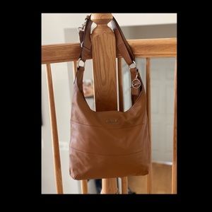 Beautiful tan coach purse